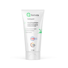 Eine 100ml Tube Satiata Med Cremelotion Satisamt® mit grünen Akzenten, deutschem Text und "Made in Germany"-Etikett; formuliert als Hautschutzbalsam mit Panthenol für trockene Haut (ab 14,99€/l).