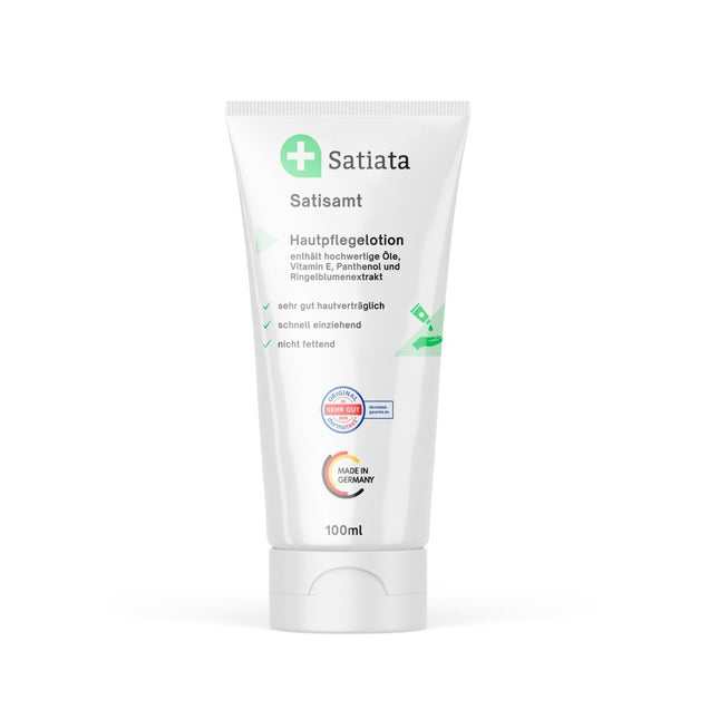 Eine 100ml Tube Satiata Med Cremelotion Satisamt® mit grünen Akzenten, deutschem Text und "Made in Germany"-Etikett; formuliert als Hautschutzbalsam mit Panthenol für trockene Haut (ab 14,99€/l).